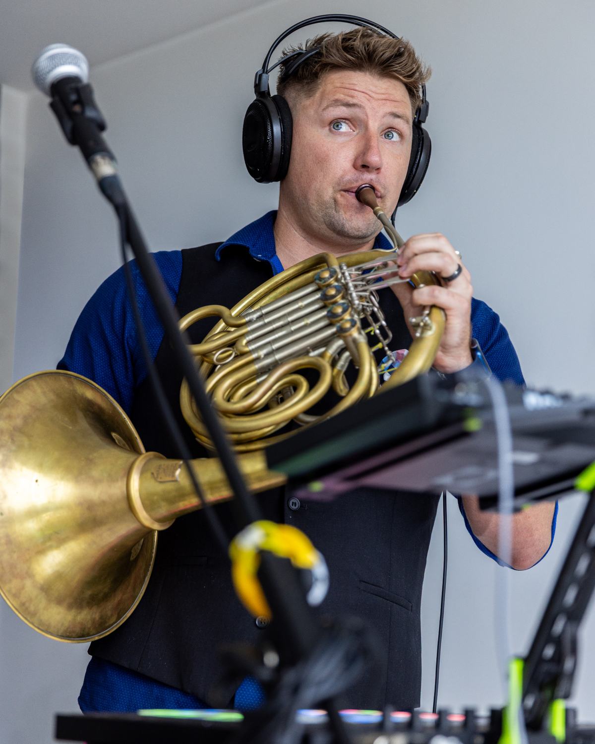 Brian KM performing on horn at his live electronics rig