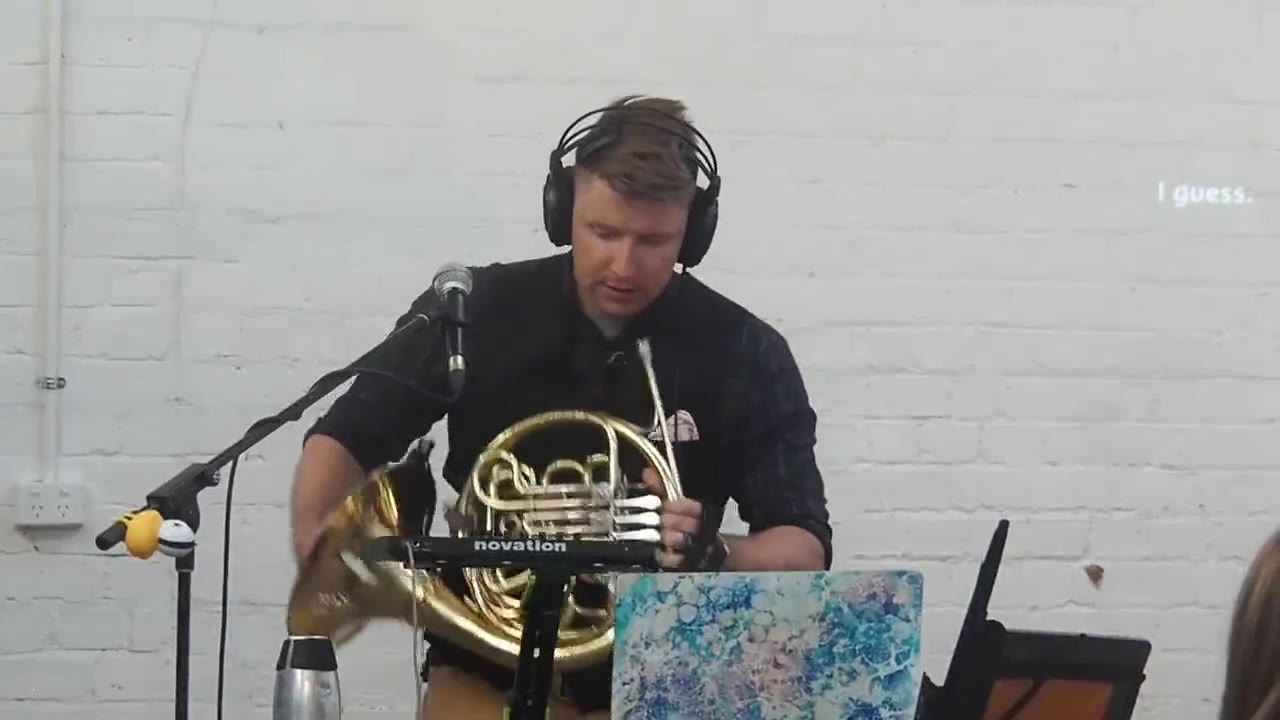Brian KM performing with horn and live electronica